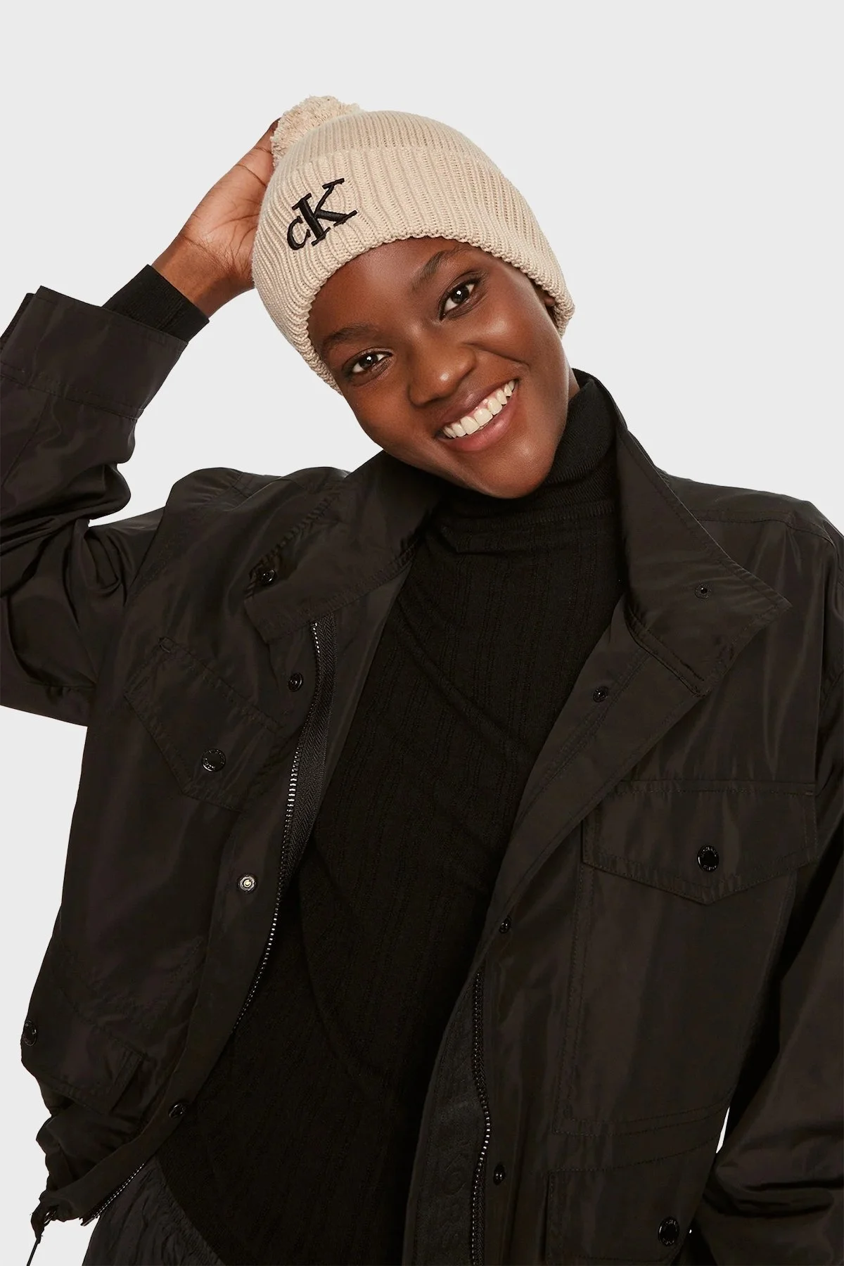 Calvin Klein Logo İşlemeli Yumuşak Ponponlu Örgü K60K612653PAS Bayan Bere K60K612653 PAS BEJ - 1