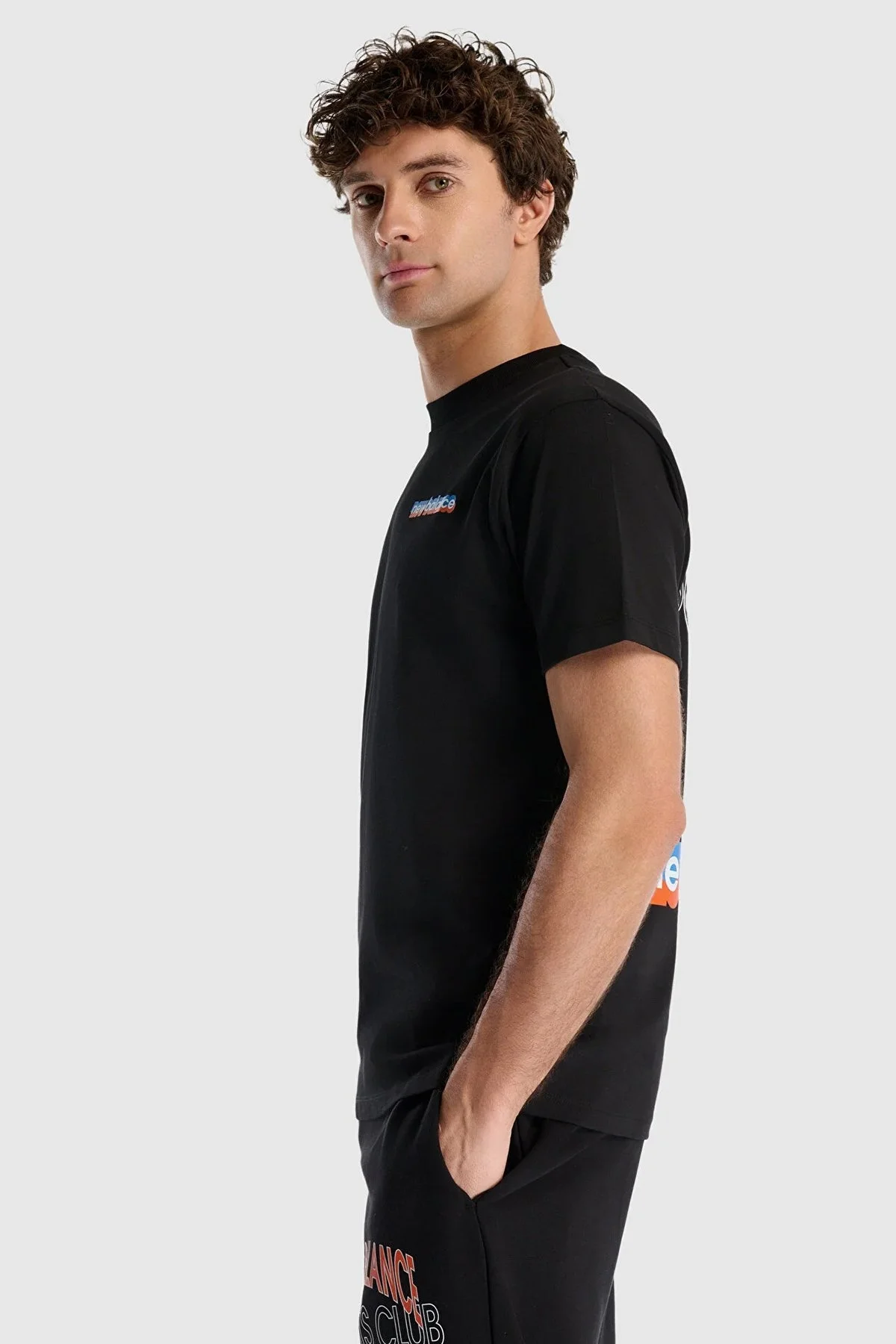 New Balance NB Lifestyle Pamuklu Comfort Fit Sırt Basklı Erkek T Shirt MNT1533BK SİYAH - 8