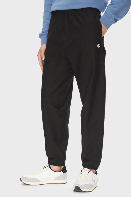 Calvin Klein Pamuklu Regular Fit Lastikli Bel Ribanalı Paça Jogger LV04RC279GUB1 Erkek Pantolon LV04RC279G UB1 SİYAH - Calvin Klein