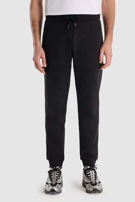 New Balance NB Lifestyle Regular Fit Normal Bel Ribanalı Paça Erkek Eşofman Altı MNP1517 BK SİYAH - New Balance (1)