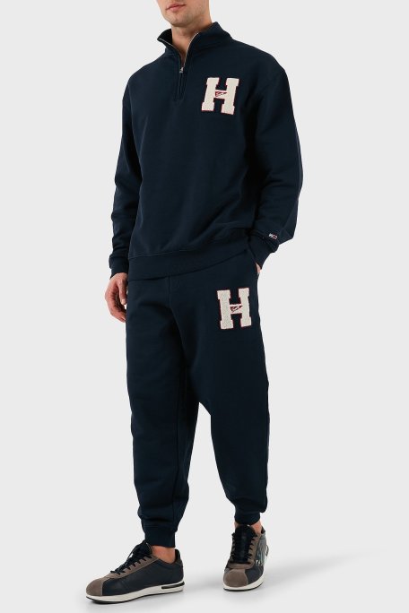 Tommy Jeans Pamuklu Relaxed Fit Normal Bel Ribanalı Paça Jogger Erkek Pantolon DM0DM21277 DYY LACİVERT - Tommy Jeans (1)