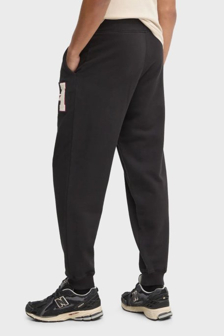 Tommy Jeans Relaxed Fit Normal Bel Ribanalı Paça Jogger Erkek Pantolon DM0DM21277 BDS SİYAH - Tommy Jeans (1)