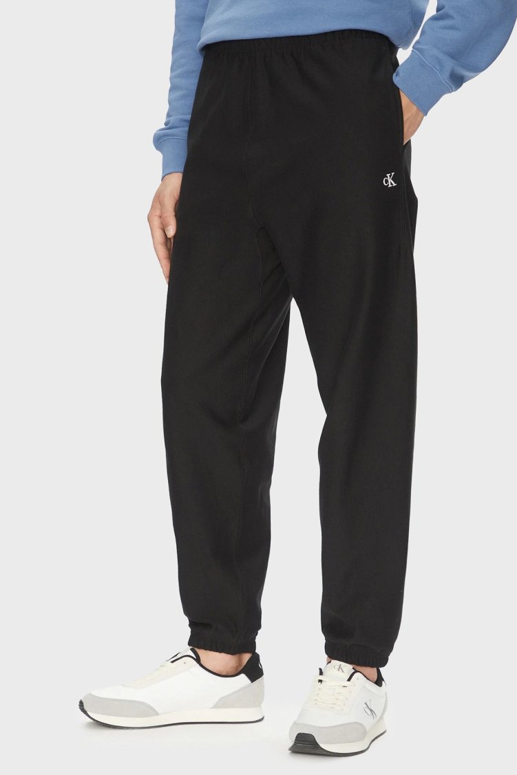 Calvin Klein Pamuklu Regular Fit Lastikli Bel Ribanalı Paça Jogger LV04RC279GUB1 Erkek Pantolon LV04RC279G UB1 SİYAH - Calvin Klein