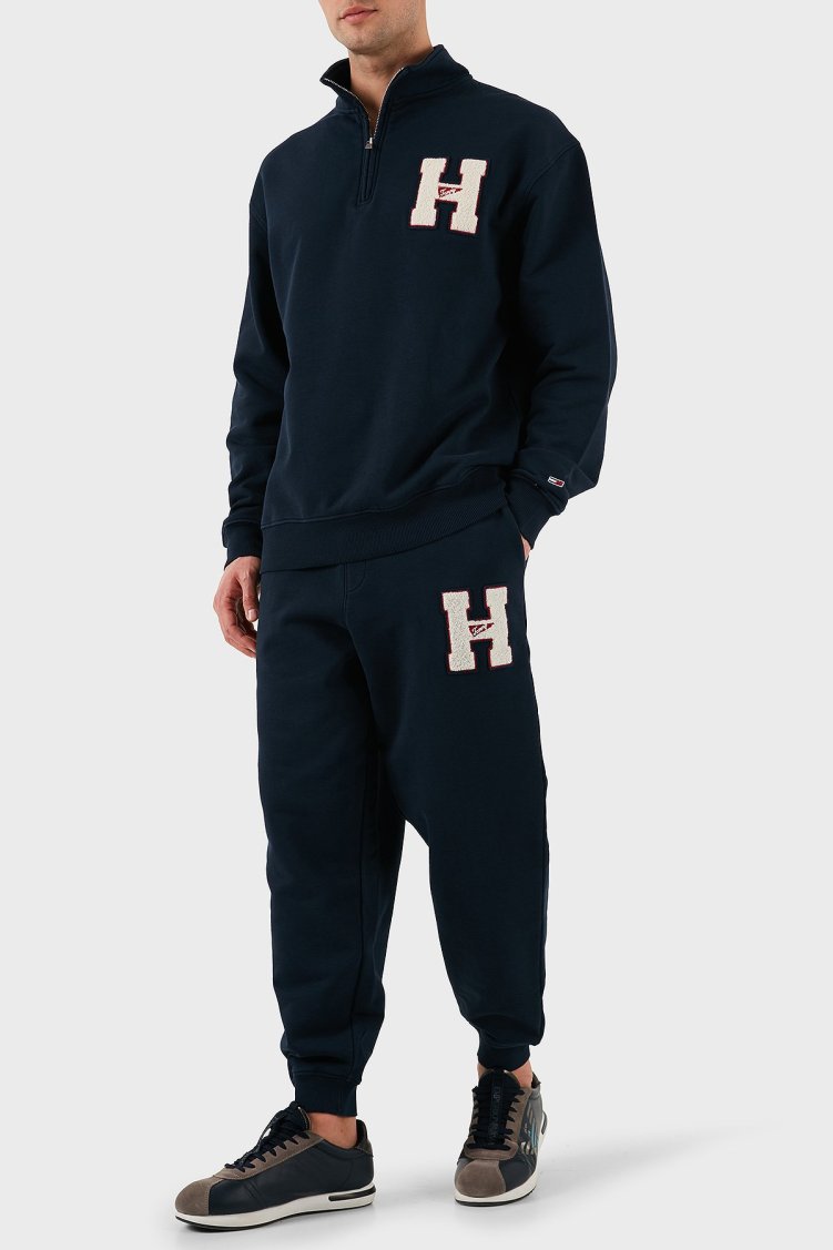 Tommy Jeans Pamuklu Relaxed Fit Normal Bel Ribanalı Paça Jogger Erkek Pantolon DM0DM21277 DYY LACİVERT - Tommy Jeans (1)