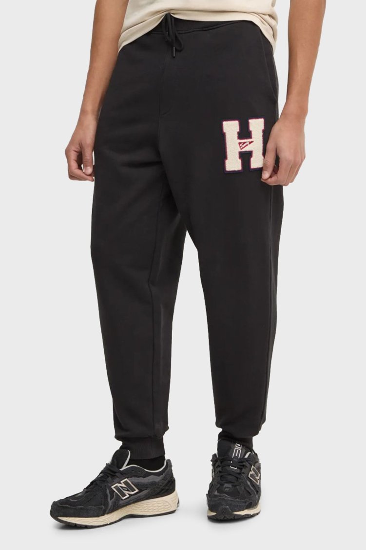 Tommy Jeans Relaxed Fit Normal Bel Ribanalı Paça Jogger Erkek Pantolon DM0DM21277 BDS SİYAH - Tommy Jeans